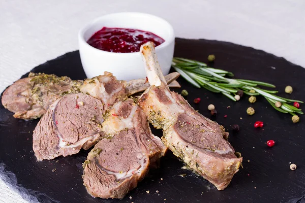 Rack of lamb with cranberry sauce — Stock Photo, Image