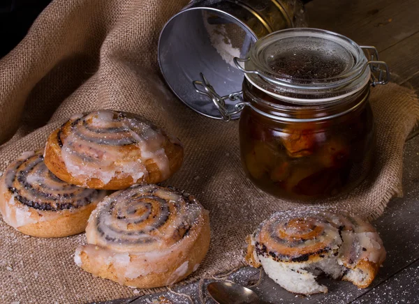 Homemade buns with poppy seeds and jam — Stock Photo, Image
