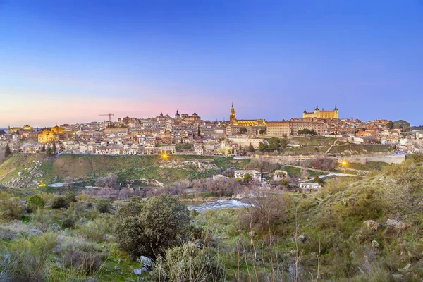 stock image View of Toledo from across the Tagus river in evening, Spain 