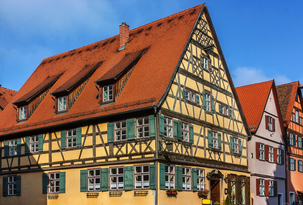 Street with historic houses in the Dinkelsbuhl city center. Dinkelsbuhl is old Franconian town, one of the best-preserved medieval urban complexes in Germany.
