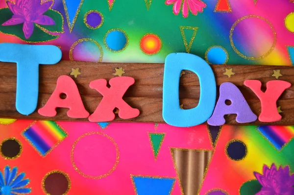 Word tax day on abstract — Stock Photo, Image