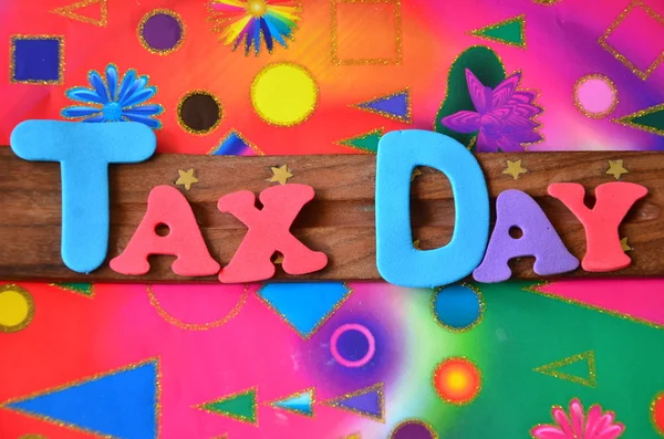 Word tax day on abstract — Stock Photo, Image