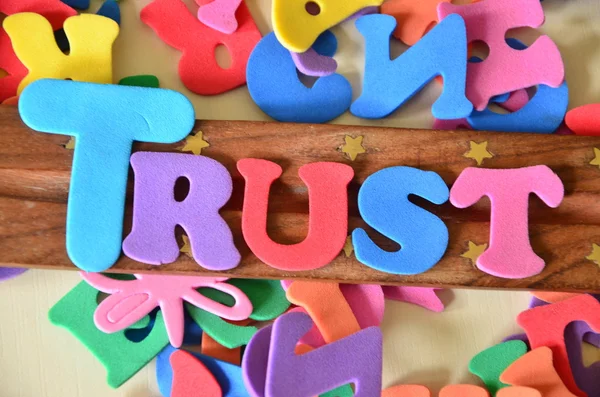 Trust ordet på ett abstrakt — Stockfoto