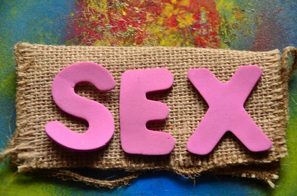 Slovo sex na abstraktní — Stock fotografie