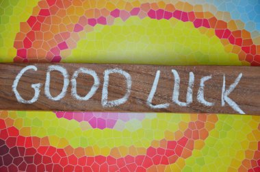 Soyut ahşap arka planda iyi şanslar.