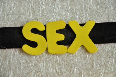 Soyut ahşap üzerinde kelime seksi.