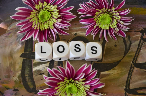 Parola di perdita e fiori — Foto Stock