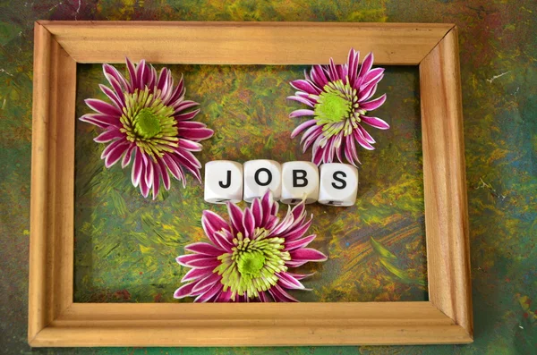 Word job and flowers — Stock Photo, Image