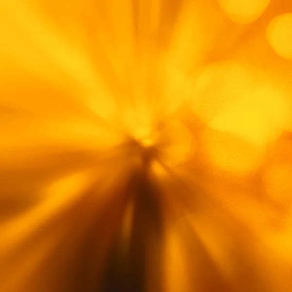 Abstract gold background with white center sun burst or lens fla — Stock Photo, Image