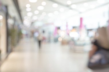 Mağaza bokeh arka plan bulanıklık. İş adamları siluetleri