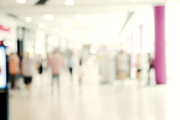 Abstraktní rozmazaný obrázek nákupního centra a lidí pro spouštění — Stock fotografie