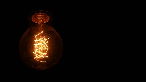 Retro Looking Light Bulb Glowing Dark Background Bright Wire Visible — Stock Photo, Image