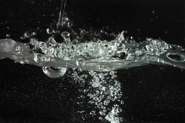 Water Splashing Poured Aquarium Tank Black Background — Stock Photo, Image