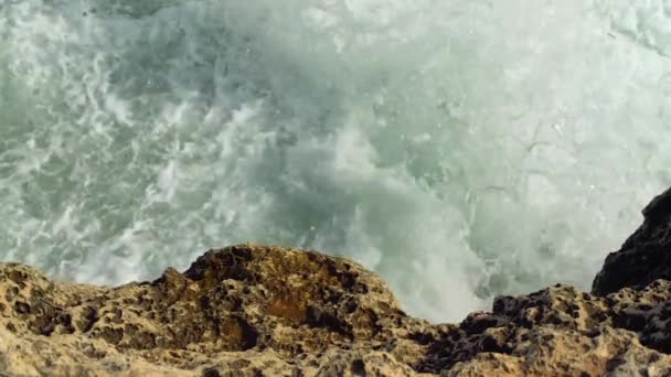 Small Waves Crashing Rocky Shore Sunny Day Slow Motion Video — Stock Video