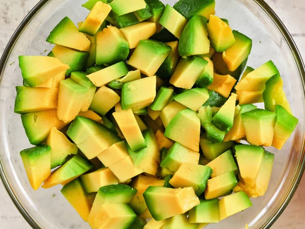 Yellow Green Avocado Pulp Cut Small Pieces Glass Bowl View — Stock Photo, Image