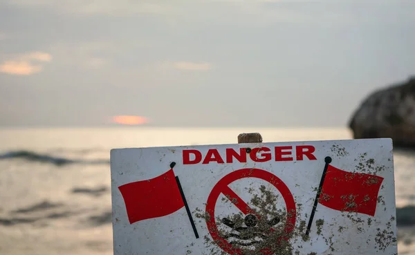 Danger Swim Sign Two Red Flags Blurred Sea Background — Stock Photo, Image