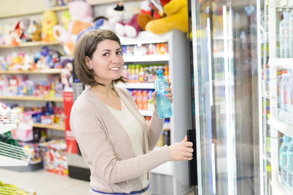 Buying Water at store Stock Picture