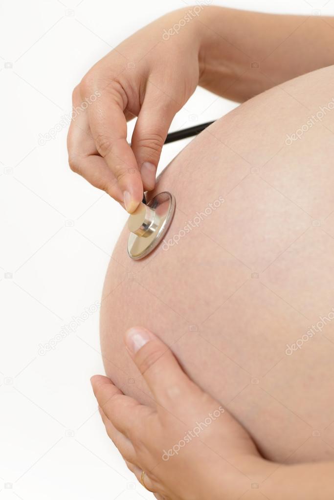 Pregnant Woman Listening her Baby