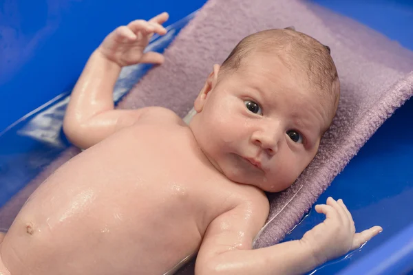 Newborn baby at bath-time — Stock Photo, Image