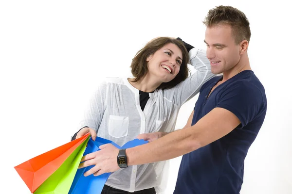 Pareja viniendo de compras —  Fotos de Stock