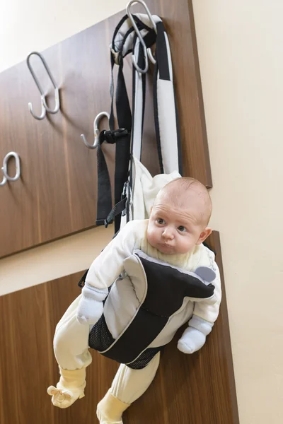 Baby in a hanger — Stock Photo, Image