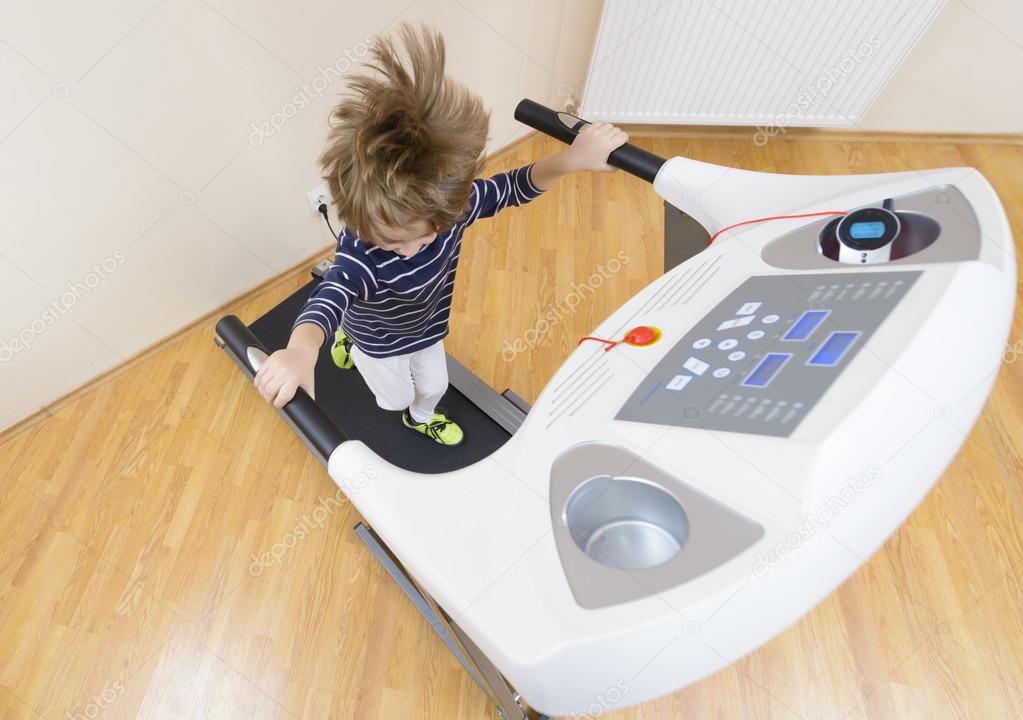 Boy running treadmill