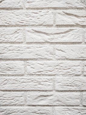 Gri kaplama, hafif desenli bir tuğla gibi stilize edilmiş.. 