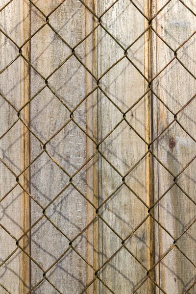 Textured Vertical Background Wooden Fence Metal Grid — Stock Photo, Image