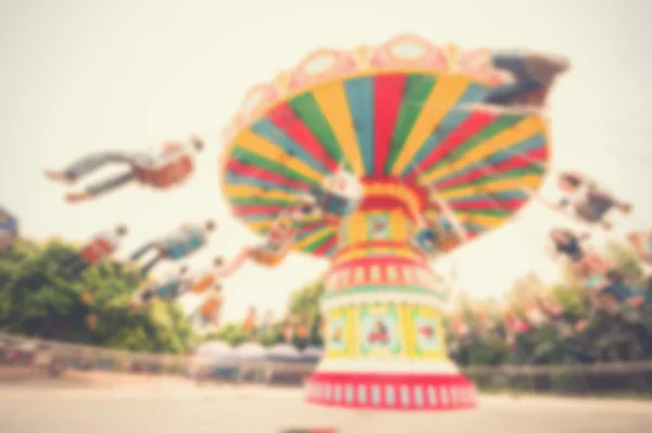 Blur background image of  roller swings in amusement park. — Stock Photo, Image