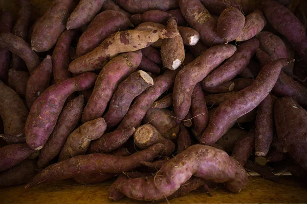 Bucket of sweet potatoes.