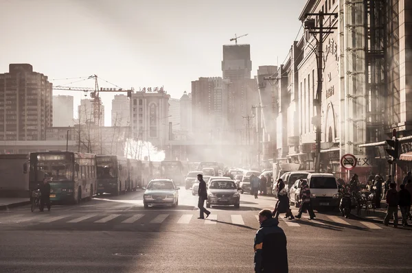 People around commercial building around Dalian trains station. — Stock Photo, Image