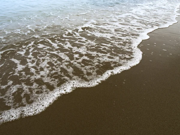 Praia de areia preta — Fotografia de Stock