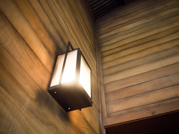 Vintage old latern lamp in barn — Stock Photo, Image