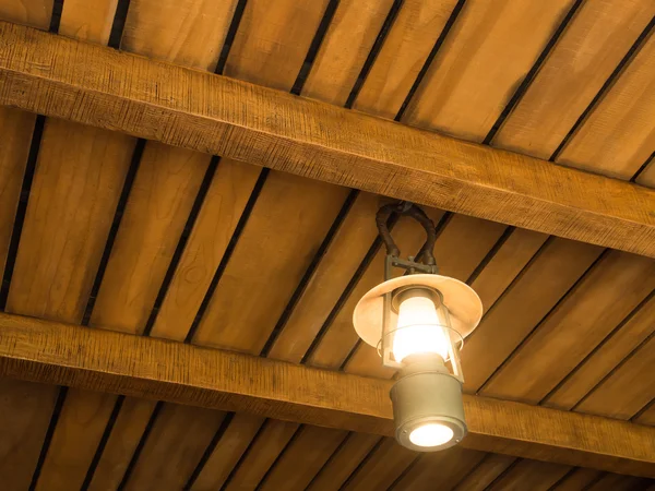 Vintage old latern lamp in barn — Stock Photo, Image