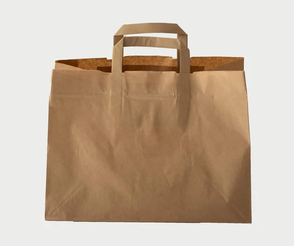 Brown paper bag or cardboard takeaway handle lunch bag isolated on white. — Φωτογραφία Αρχείου