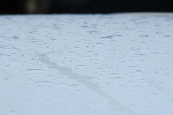 Texture background. raindrops on paintwork. Precipitation in the form of water droplets.