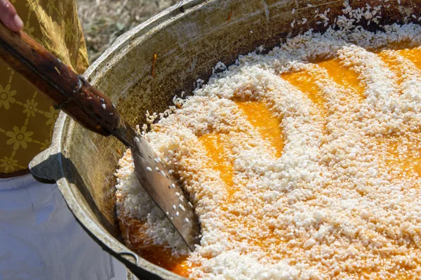 Uzbek national dish pilaf. a Middle Eastern or Indian dish of rice (or sometimes wheat) cooked in stock with spices, typically having added meat or vegetables.