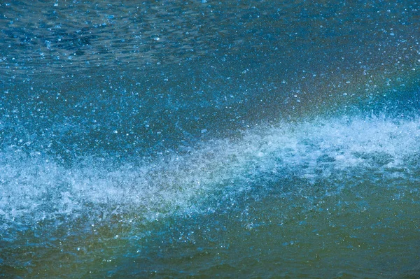 Textura Fundo Splashes Água Uma Fonte Jato Fluido Ejetado Tubo — Fotografia de Stock