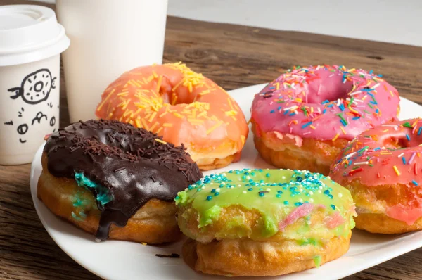 donuts. Round fried in fat patty. a small fried cake of sweetened dough, typically in the shape of a ball or ring. sinker, fritter, doughnut, dough-boy