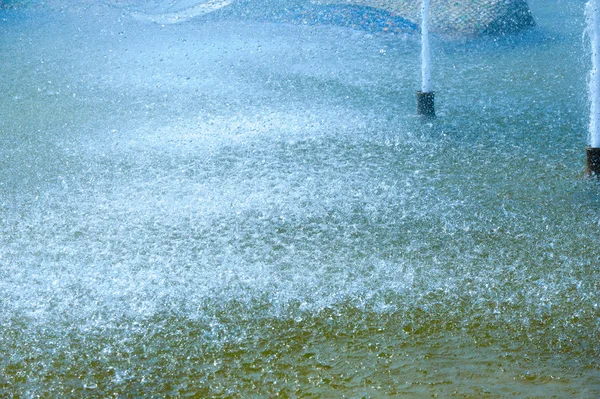 Textur Hintergrund Wasserspritzer Aus Einem Brunnen Der Flüssigkeitsstrahl Aus Dem — Stockfoto