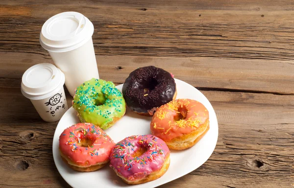 donuts. Round fried in fat patty. a small fried cake of sweetened dough, typically in the shape of a ball or ring. sinker, fritter, doughnut, dough-boy