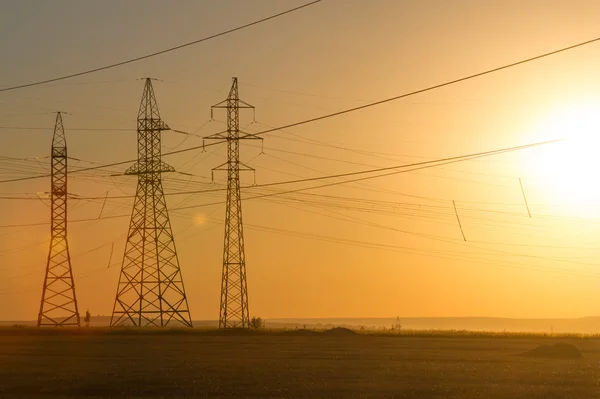 Linia Elektroenergetyczna Wysokiego Napięcia Filary Energii Zachodzie Słońca Świt Wysokiego — Zdjęcie stockowe