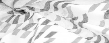 Siyah geometrik eşkenar dörtgen şekilli beyaz ipek kumaş. Karanlık. Geçmişi. Şablon.