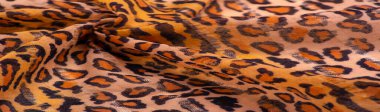 Leopar desenli ipek kahverengi kumaş. Leopar desenli açık ipek senin tasarımına mükemmel uyacak, modaya uygun ve kaba değil! Doku, arkaplan, desen