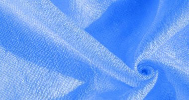 Parlak mavi malzeme. Bu ipek son derece pürüzsüz ve yumuşak, güzel pürüzsüz bir dokusu var. arkaplan deseni