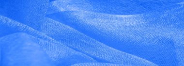 Parlak mavi malzeme. Bu ipek son derece pürüzsüz ve yumuşak, güzel pürüzsüz bir dokusu var. arkaplan deseni