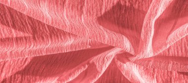 İpek kumaş. Kırmızı kırışık kumaş dokusu. Kırmızı buruşuk peri dokusu dalgalı yüzey, yakın çekim, yumuşak odak. arkaplan, kalıp