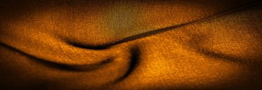 Arka plan dokusu koyu sepia kahverengi şifon ipeği yumuşak şeffaf bir kumaştır ve pürüzlüdür (matte, creped) çünkü bükülmüş iplik kullanımı.