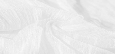 İpek kumaş. Beyaz buruşuk kumaşın dokusu. Beyaz buruşuk, dalgalı yüzey dokusu. Yakın çekim, yumuşak odaklanma. arkaplan, kalıp