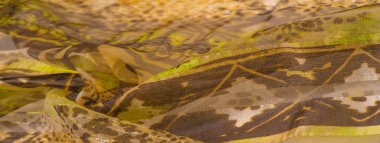 ipek kumaş, yeşil-kahverengi, soyut arka plan kumaşı veya sıvı dalga veya grunge ipek kumaş kıvrımlı kadife kumaş veya lüks Noel arkaplanı veya zarif duvar kağıdı tasarımı